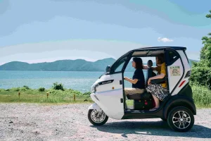 Electric tuk-tuk tour along Lake Biwa in Nagahama, Shiga, enjoying scenic lakeside views