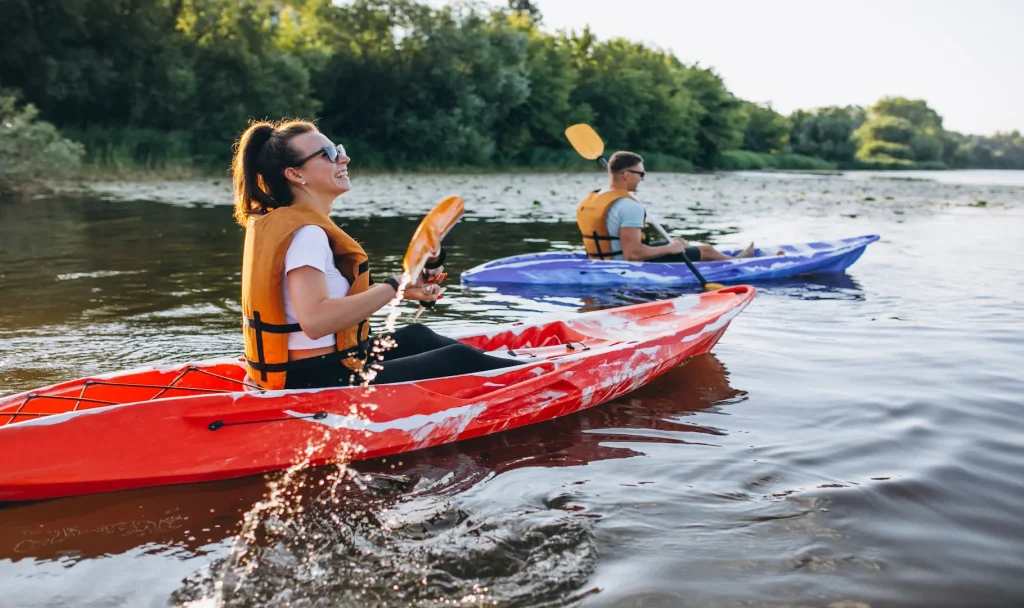 Visitors canoeing on calm waters while enjoying an outdoor experience during a Lake Biwa nature tour